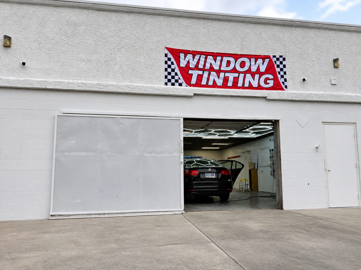 Tint Broz storefront and open installation bay in Las Vegas